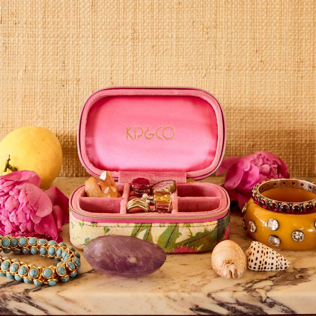Australian Bush Blossom travel box open with rings and necklaces on a styled shelf
