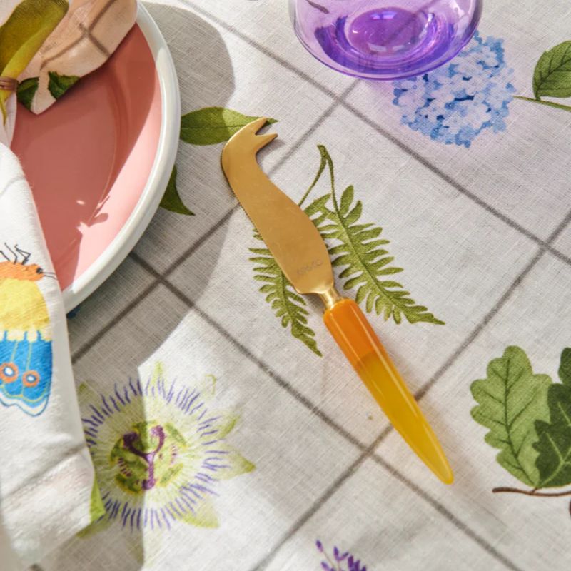 Enhance your cheese platters with Kip & Co's Lemon Zest Knife, available at Cove. This knife is not only stylish but also durable, making it a perfect addition to your kitchenware collection. Its vibrant design adds a pop of color to your table setting while ensuring functionality and ease of use.