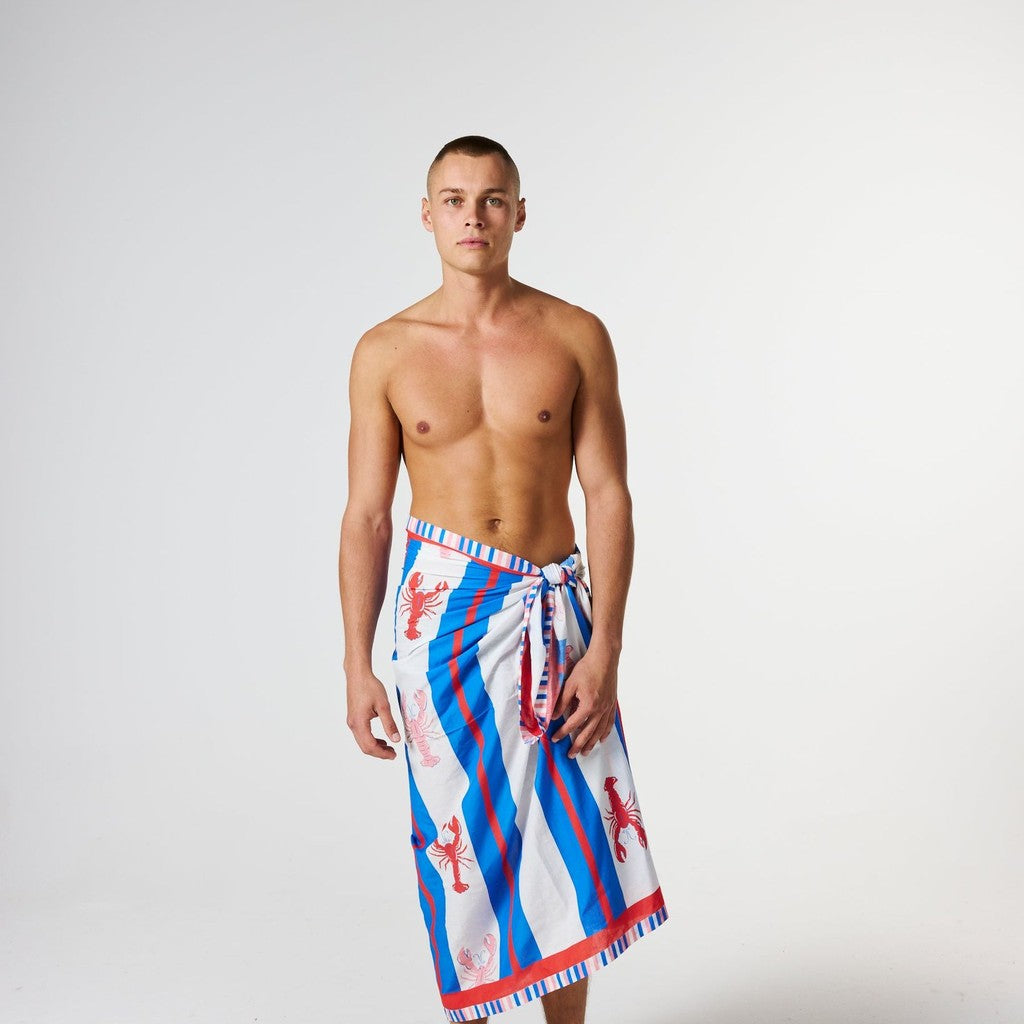 Man wearing the Lobster Fan Club sarong as a wrap