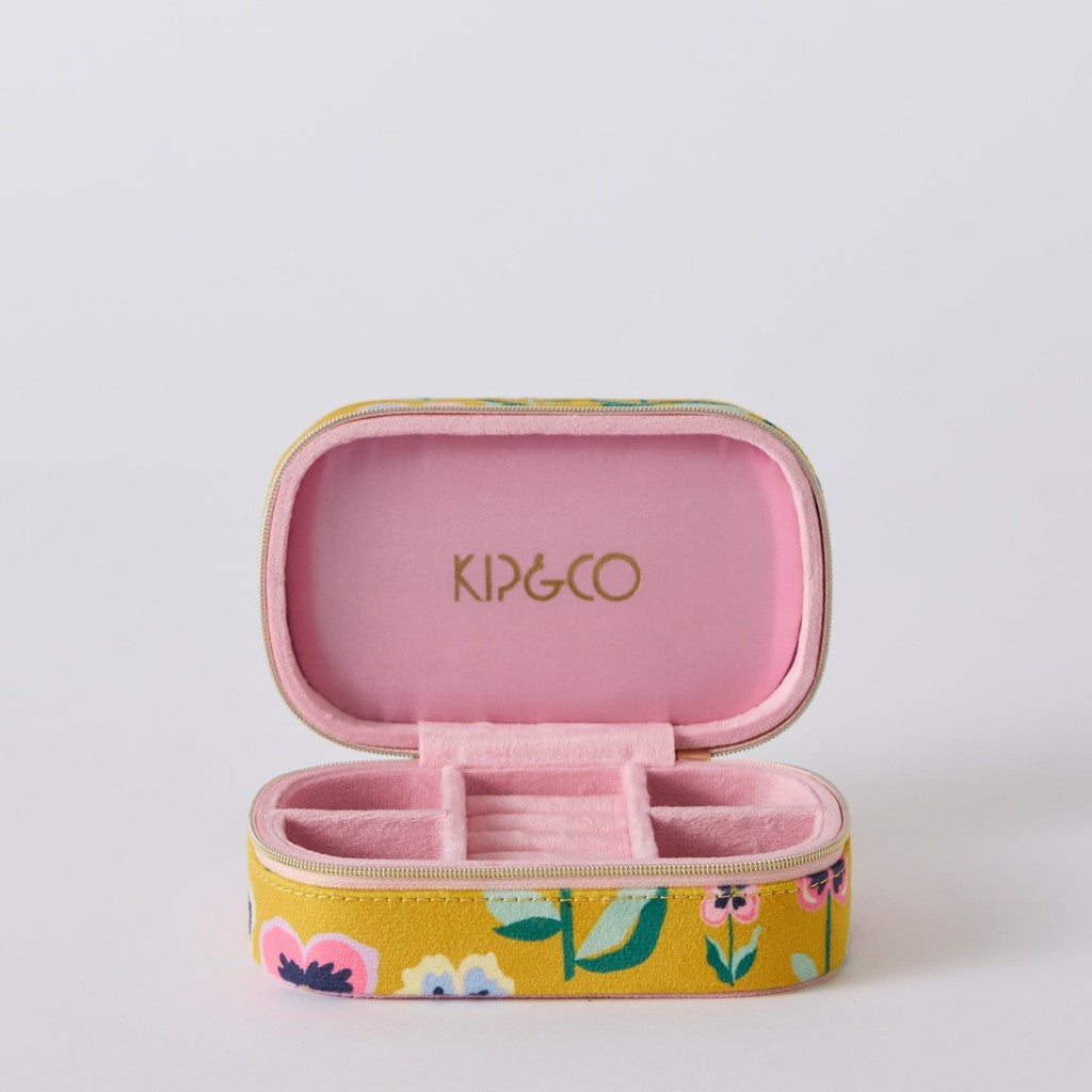 Pretty Pansy travel jewellery box open on a grey background