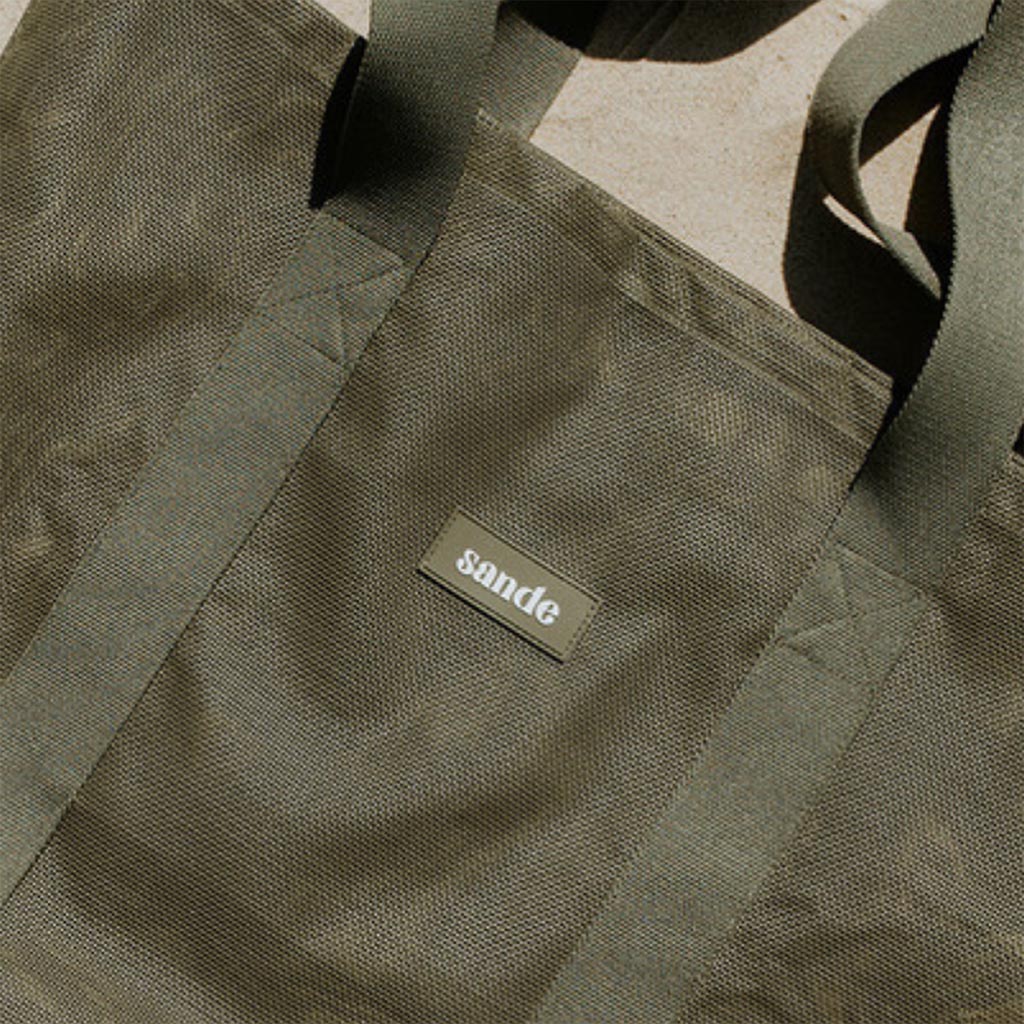 sande-kids-large-mesh-beach-bag-pandanus,6,SANDE 55L Pandanus mini bag Ð waterproof PVC mesh close-up