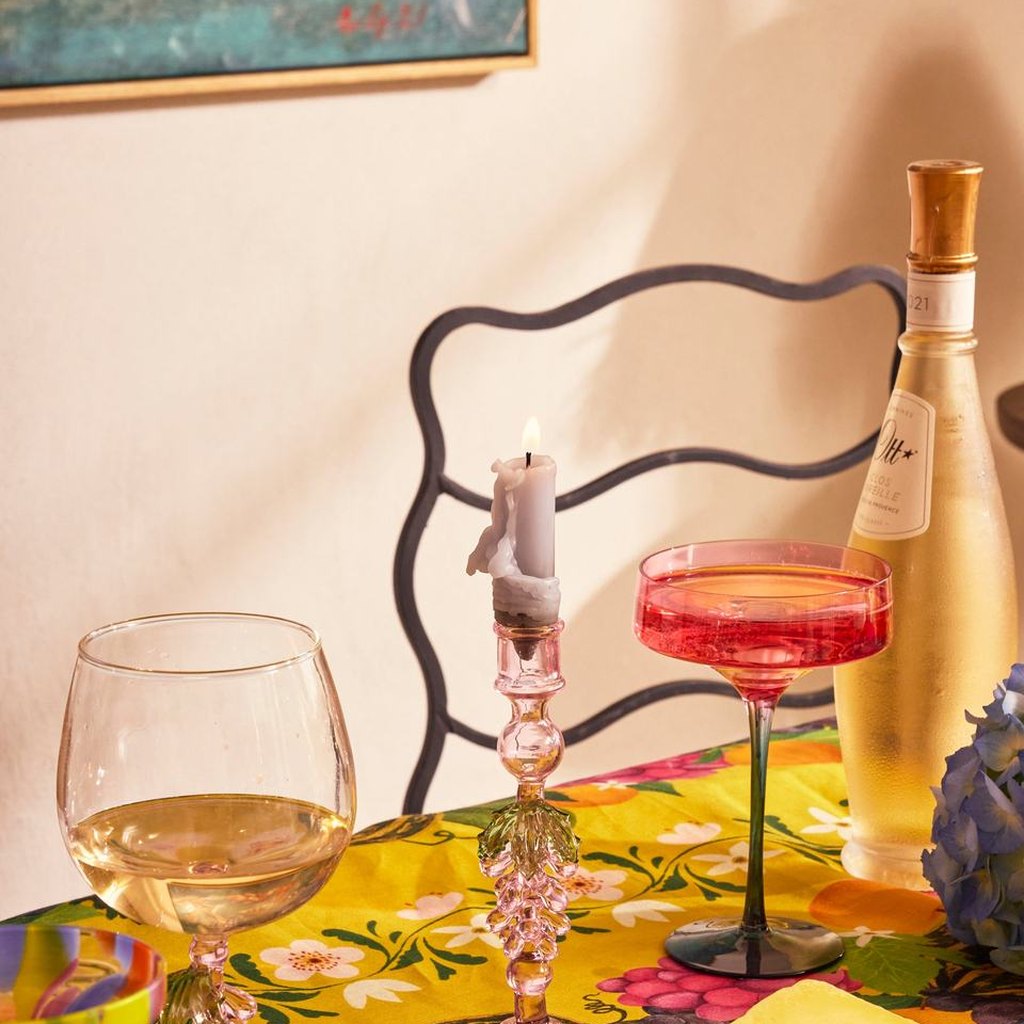 Pink Under The Vine candlestick holder with wine glasses