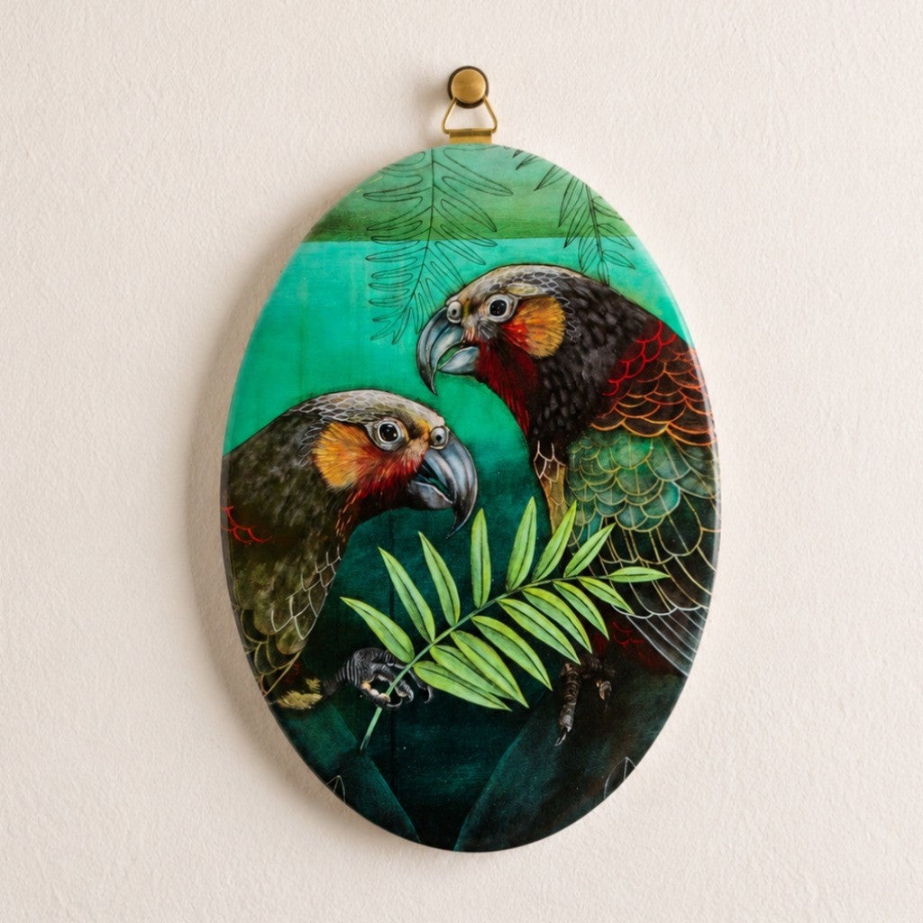 Kathryn Furniss Kākā art tile hanging on a wall