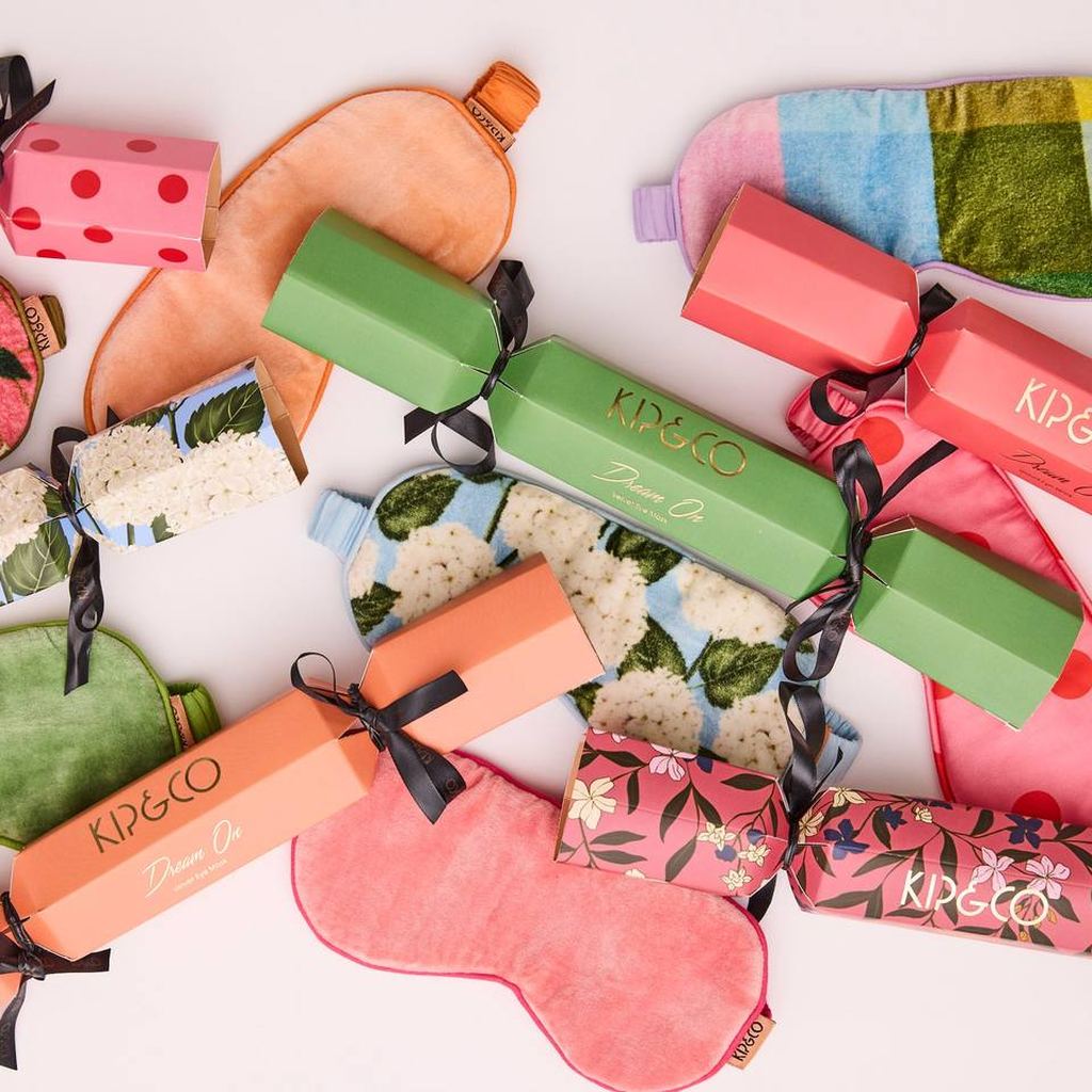 Christmas Slumber bon bons and eye masks laid out together