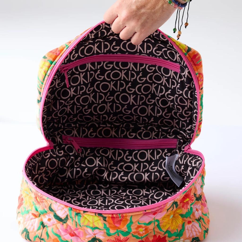 Kip & Co | Popping Flowers Peach Quilted Toiletry Case - Cove. Beach Essentials