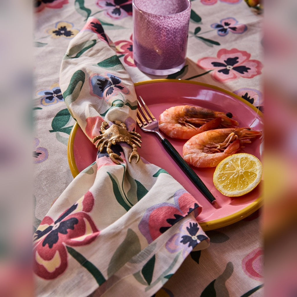 Pretty Pansy napkins on a set table