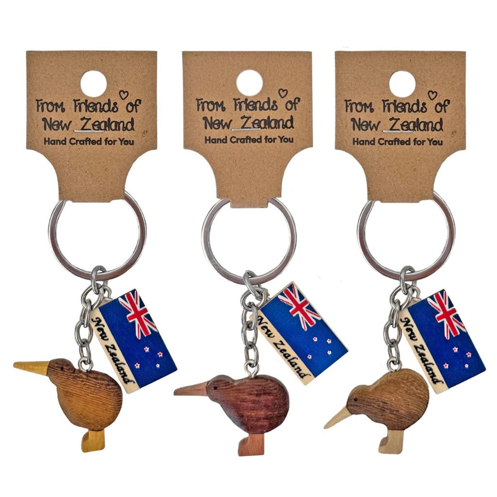 Three mini wooden kiwi keyrings on their gift cards