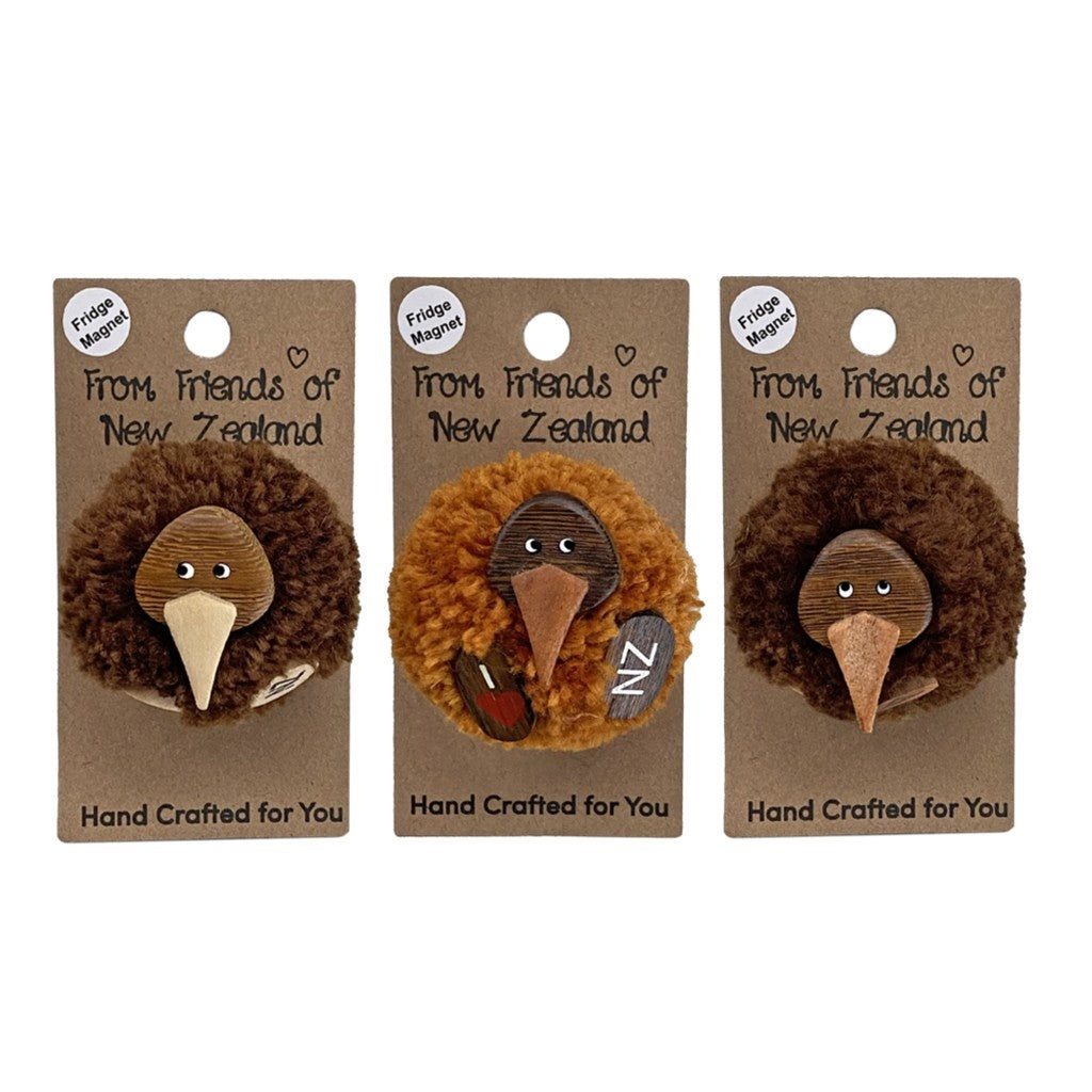 Three pompom kiwi magnets on their gift cards