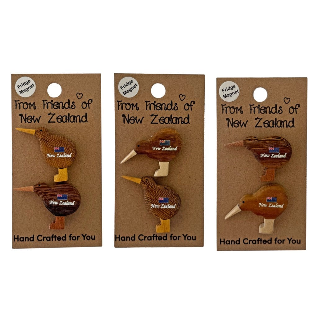 Three mini wooden kiwi magnets on their gift cards
