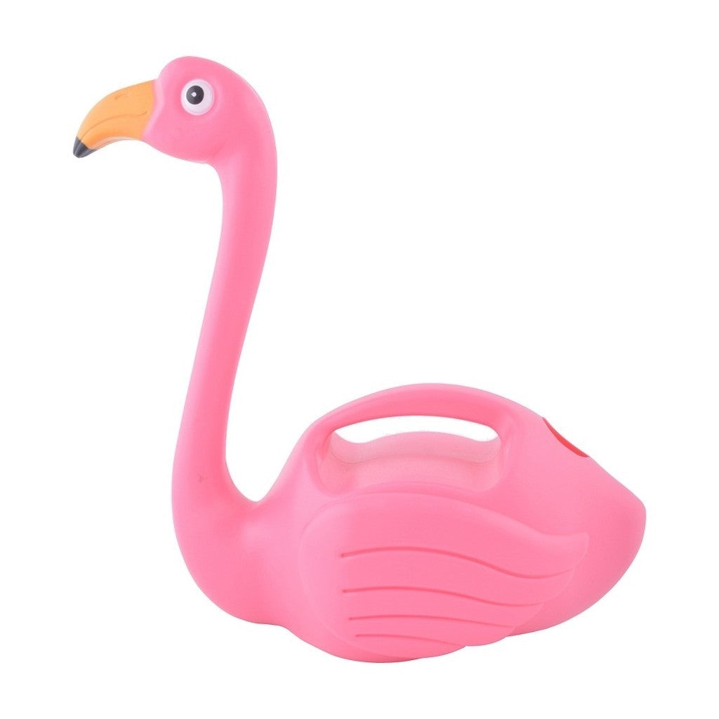 Pink flamingo watering can on white