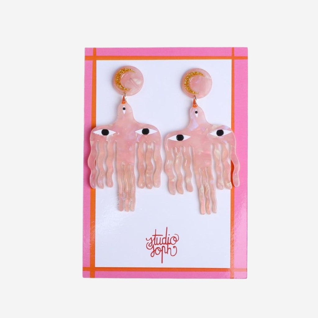 Studio Soph Big Birds Galaxy Pink earrings on their backing card