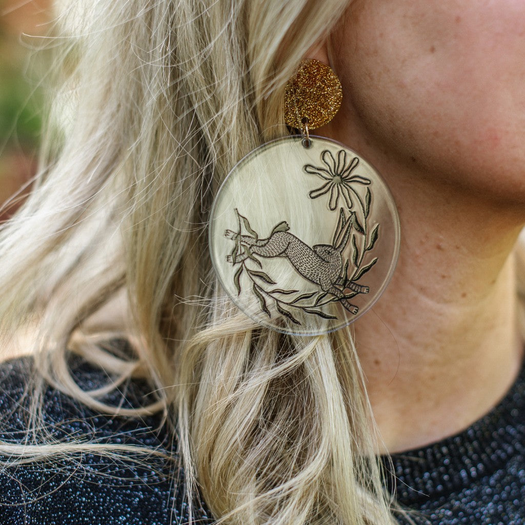 Model wearing Studio Soph Blue Disk earrings