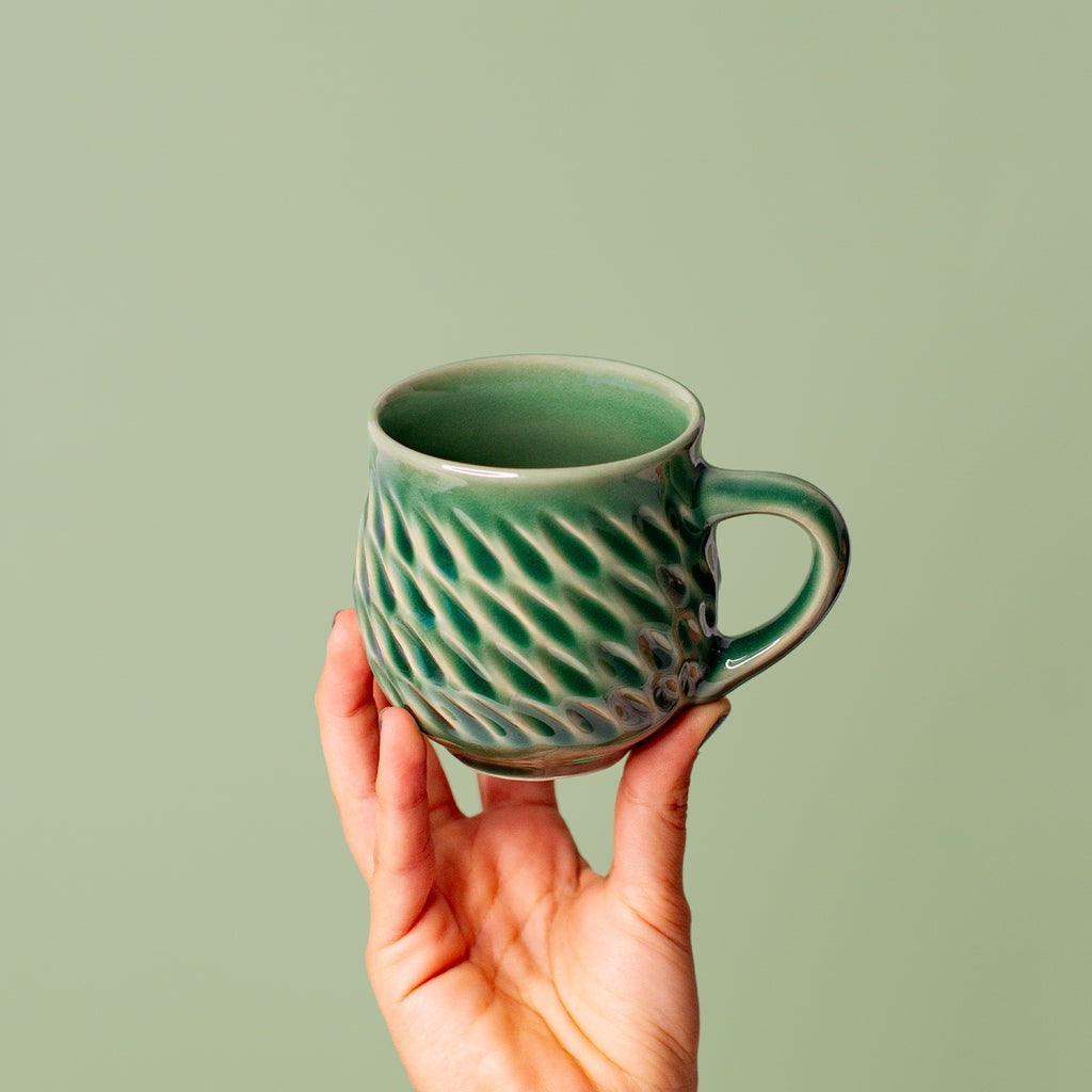 http://covehahei.nz/cdn/shop/products/Pottery-for-the-Planet-Belly-Mug-Sage-8oz--S.jpg?v=1703377803