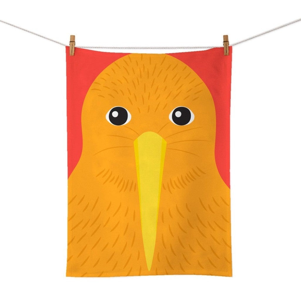 Bright Kiwi Tea Towel hanging on a line