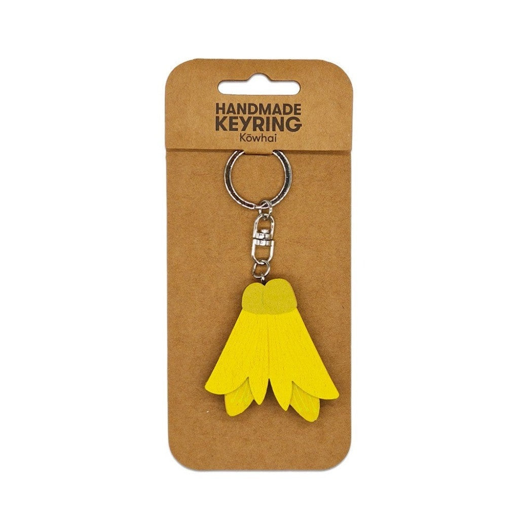 Kowhai Wooden Keyring on its backing card