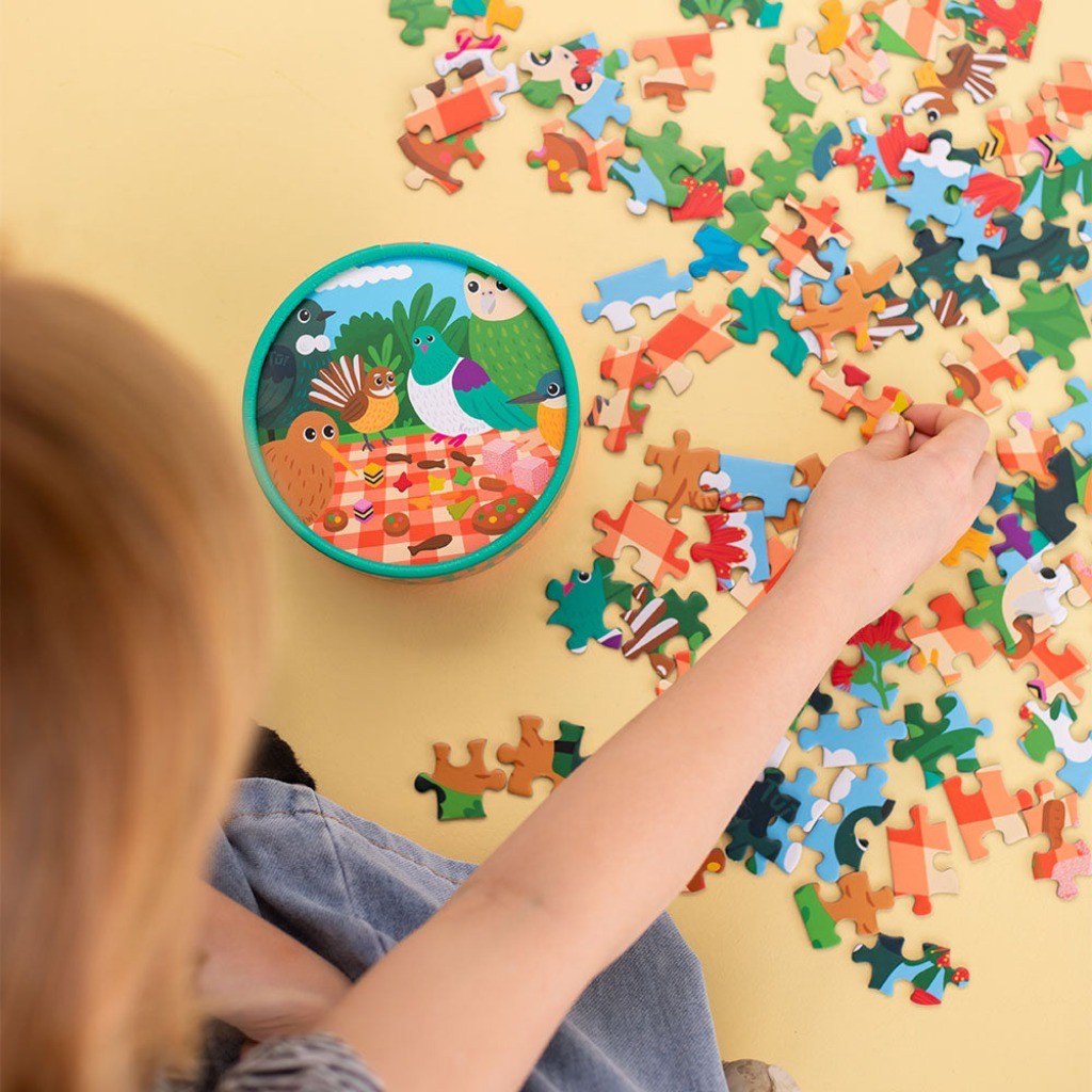 Child doing the Picnic Tweets Kids Puzzle