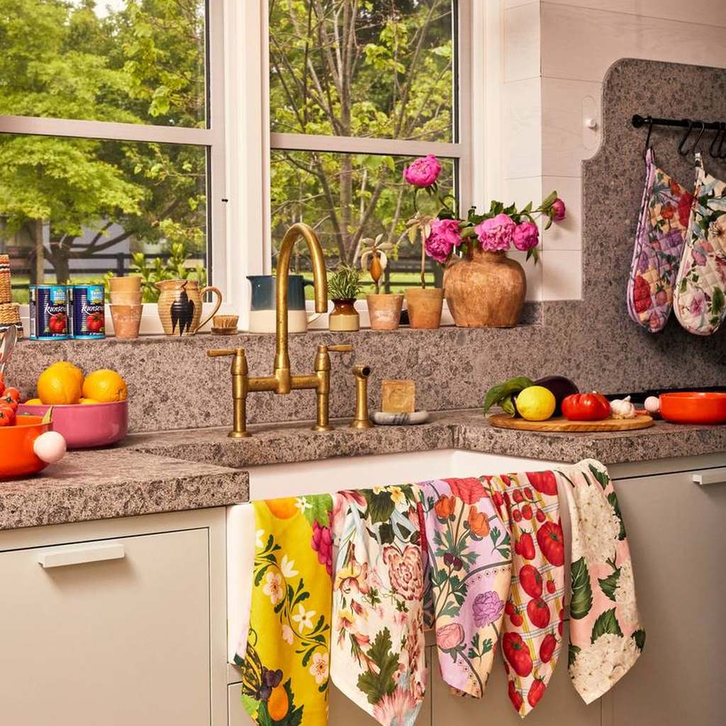 Kip & Co tea towels hanging along a kitchen sink