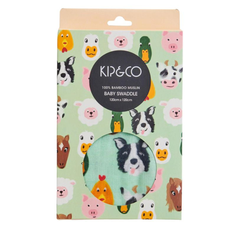 The image likely shows a cozy and colorful bamboo swaddle from Kip & Co's Farm Friends collection, designed for babies. The swaddle is made from eco-friendly materials and is available at Cove.