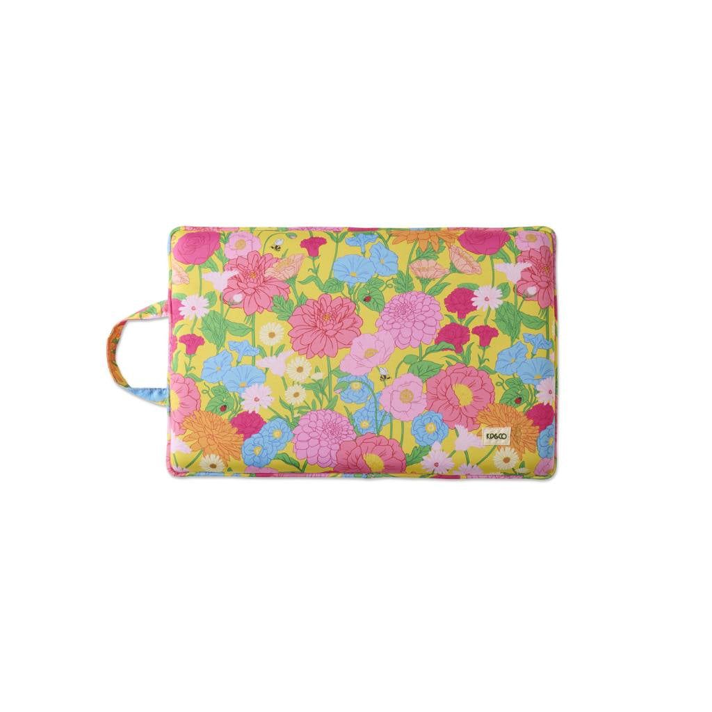 The image shows a garden kneeling mat in a vibrant yellow color. The mat is rectangular with rounded edges and features a textured surface for added comfort and grip. It is designed to provide cushioning and support for the knees while gardening or performing tasks that require kneeling. The bright yellow color is eye-catching and adds a cheerful touch to gardening activities.