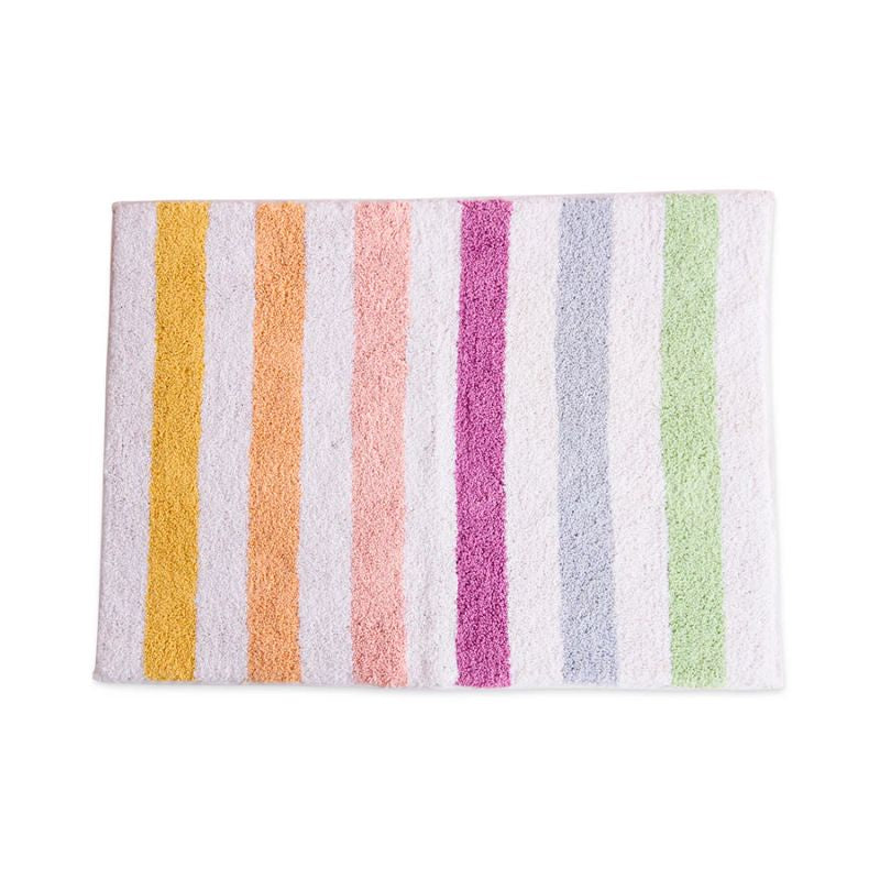 The image shows a colorful bath mat with a striped pattern in various shades. The mat is made from eco-friendly cotton and is part of Kip & Co's Portofino Stripe collection, available at Cove.