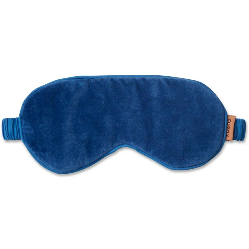 The image likely features a luxurious velvet eye mask from Kip & Co, available at Cove. The eye mask is designed for ultimate comfort and style, perfect for enhancing your sleep experience.