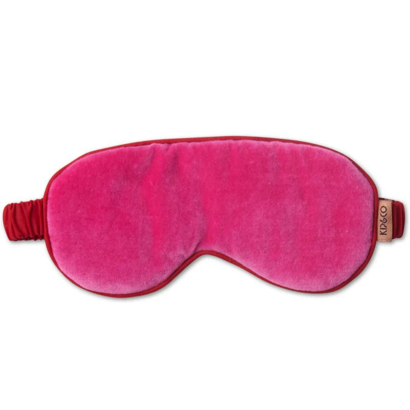 The image likely showcases a luxurious Kip & Co Velvet Eye Mask available at Cove. The eye mask is made from 100% cotton velvet, offering a plush and comfortable experience.