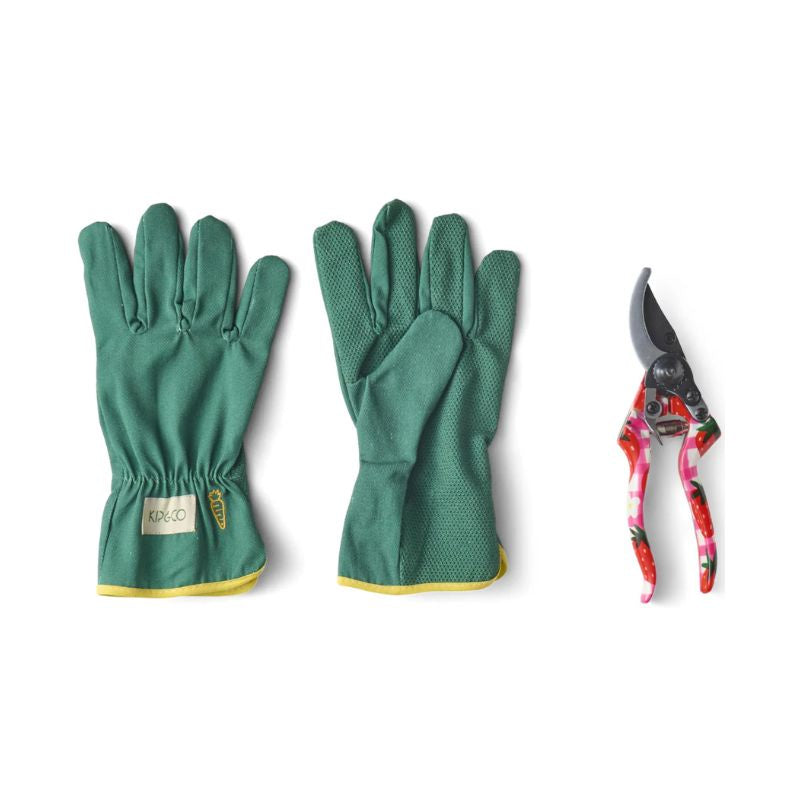 The image likely features a pair of vibrant, stylish gardening gloves and secateurs from Kip &amp; Co&#39;s Strawberry Jam collection, available at Cove. The gloves are designed with a colorful strawberry pattern, adding a touch of fun to gardening tasks, while the secateurs are crafted for both functionality and aesthetic appeal.