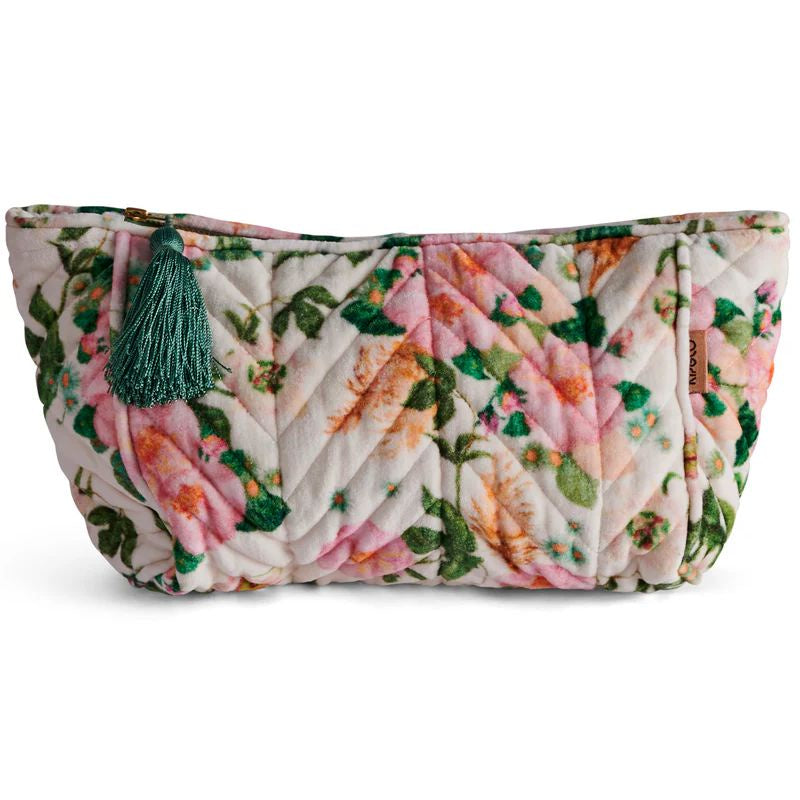 Shop Kip & Co Velvet Toiletry Bag at Cove. This eco-friendly bag features a beautiful floral design and offers plenty of space for all your essentials. Perfect for travel or everyday use!