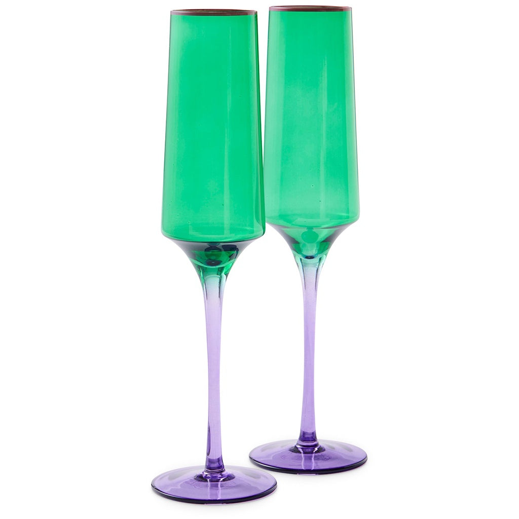 Celebrate in style with Kip & Co Champagne Glasses at Cove. These hand-blown glasses are vibrant and unique, perfect for any special occasion.