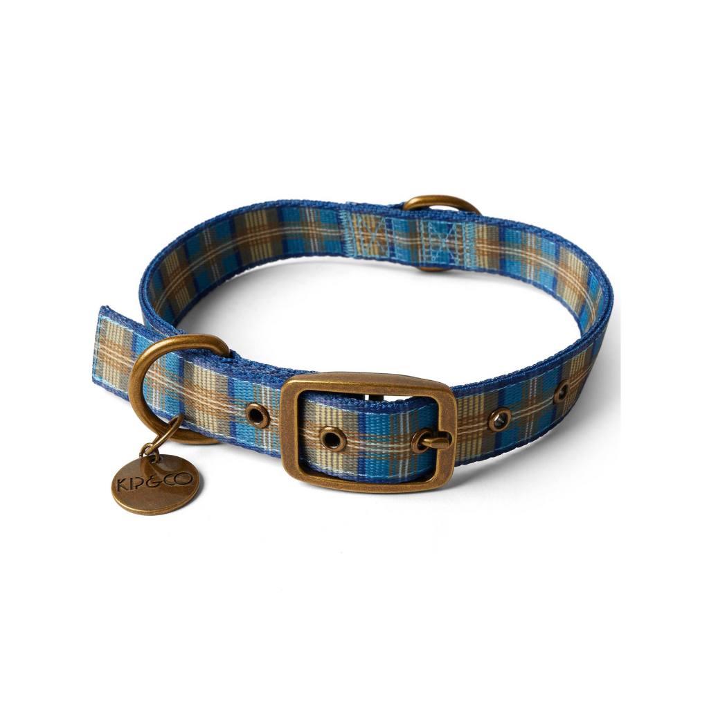 Discover the Kip &amp; Co Tartan Dog Collar at Cove! This stylish and chic collar is available in three different sizes to ensure a perfect fit for your furry friend.