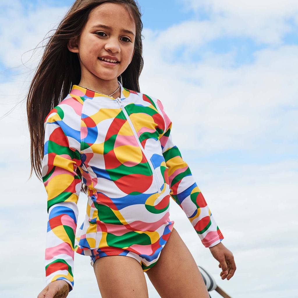 Explore the Kip & Co Colour Me Happy Bathers at Cove! These vibrant and fun swimwear pieces offer UPF 50+ protection, ensuring both style and safety under the sun. Perfect for adding a splash of color to your beach or pool day!