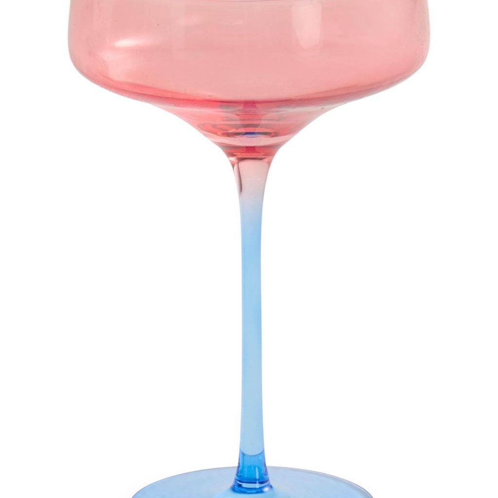The image shows a set of two margarita glasses from Kip &amp; Co. Each glass features a unique design with a blue robin motif. The glasses are elegantly shaped with a wide, shallow bowl and a sturdy stem, perfect for serving margaritas or other cocktails. The blue robin design adds a touch of whimsy and color, making these glasses both functional and decorative. The background is plain, allowing the focus to remain on the intricate details and vibrant colors of the glasses.