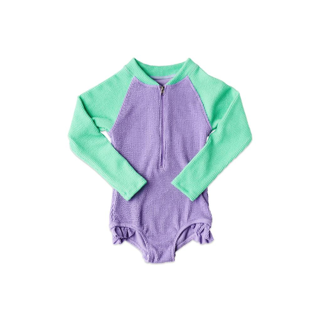 Shop Kip & Co Frutti Crinkle Bathers at Cove. These vibrant, eco-friendly bathers offer UPF 50+ protection, ensuring both style and safety in the sun!