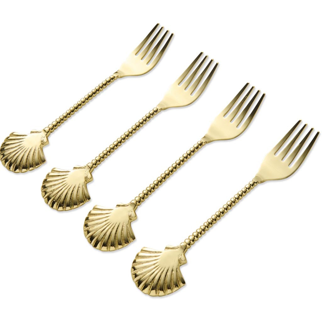 The image shows a set of four oyster forks, each with a unique and artistic design. The handles of the forks are crafted to resemble seashells, with intricate detailing that mimics the natural texture and appearance of real shells. The metal part of the forks is polished and shiny, contrasting with the more organic look of the handles. The overall aesthetic is elegant and coastal, suggesting a theme inspired by the ocean or beach. The forks are arranged neatly, likely to showcase their design and craftsmans