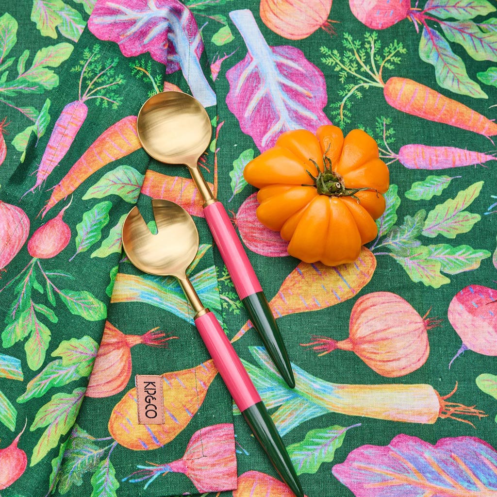 The image shows a set of salad servers, which typically includes a fork and a spoon designed for serving salads. These particular servers have a stylish and elegant design, with handles that might feature a unique pattern or color scheme, possibly inspired by Tuscan or Mediterranean aesthetics. The materials used could be metal, wood, or a combination, giving them a sophisticated and functional appearance suitable for both casual and formal dining settings.