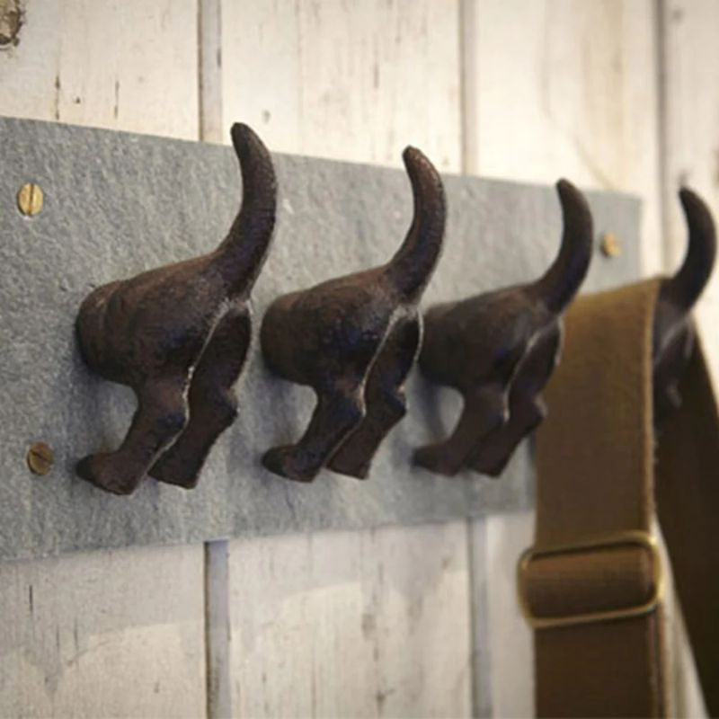 Parnell &amp; Co cast iron 4 hook dog tail coat rack on slate