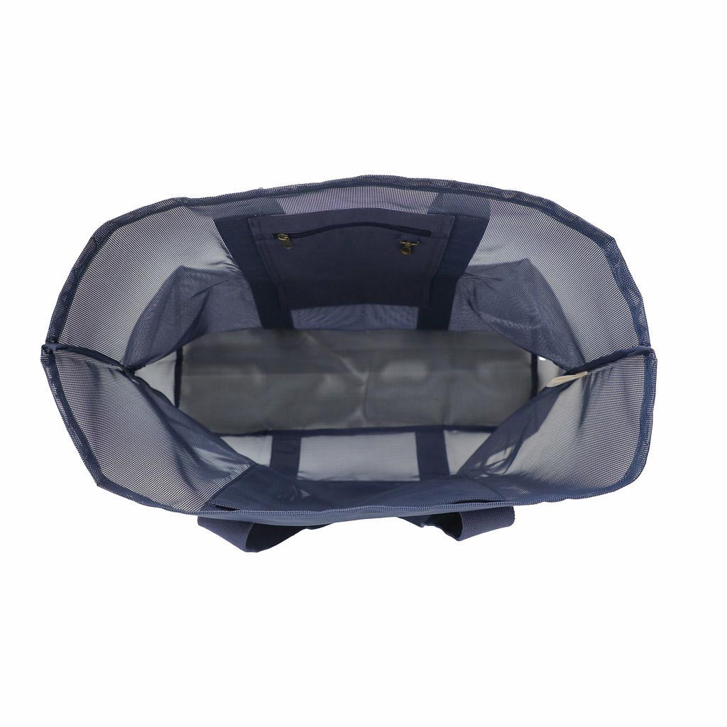 sande-kids-oversized-mesh-beach-bag-deep-sea,9,Deep Sea navy SANDE bag Ð lifestyle shot NZ summer