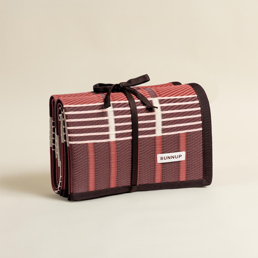 SUNNUP EMBER outdoor mat - recycled polypropylene picnic and camping mat in warm ember colorway
