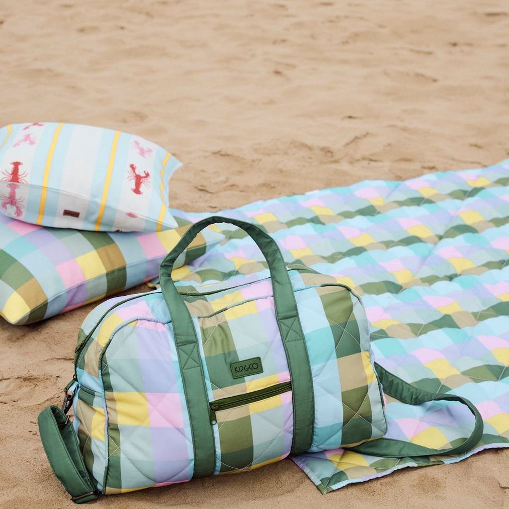 Kip & Co Sorbet Tartan quilted duffle bag in pastel check with green handles
