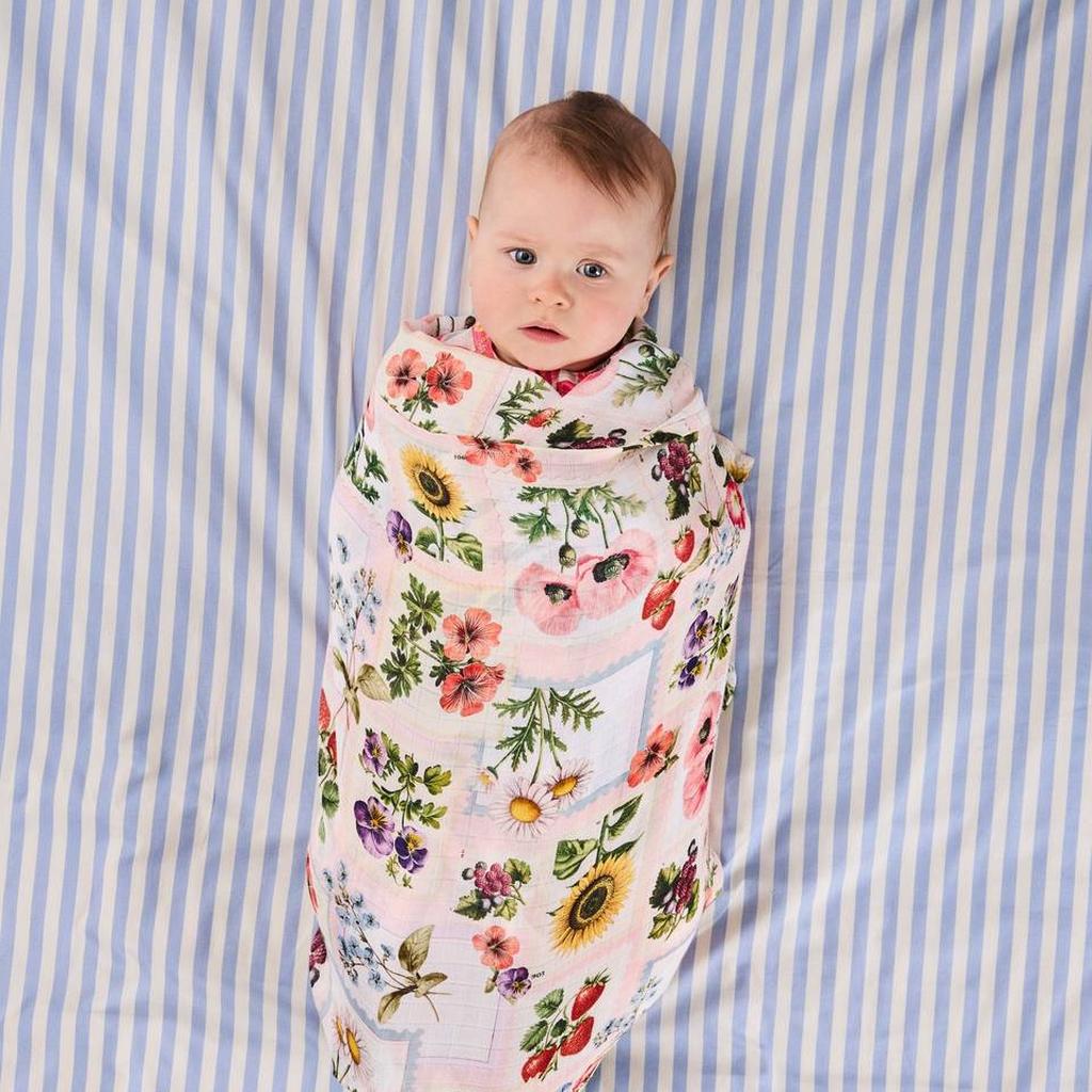 Baby wrapped in the Sweet Life bamboo swaddle