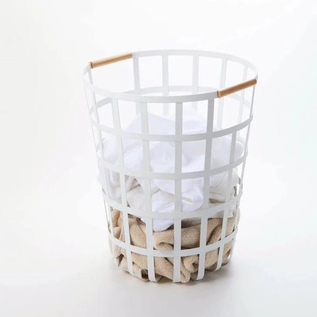 Yamazaki Tosca Round Laundry Basket: Minimalist white design, sturdy frame, spacious interior for stylish home organization.