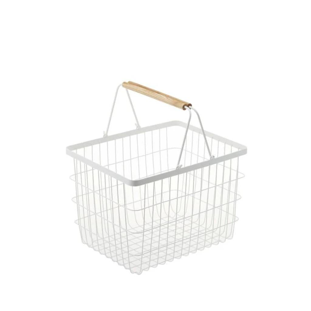 Compact white Yamazaki Tosca Laundry Basket, stylish and durable, perfect for kitchens or laundry areas.