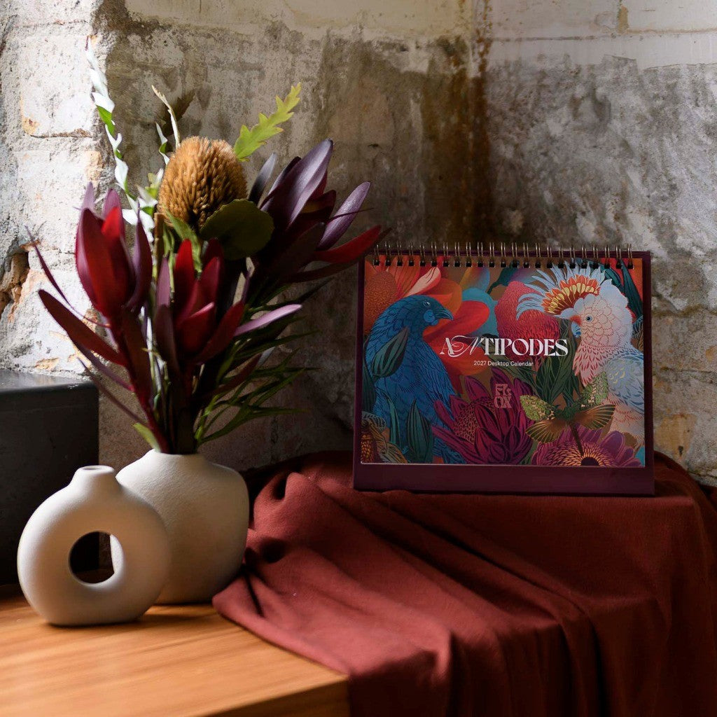 FLOX Antipodes 2027 desktop calendar styled on a shelf