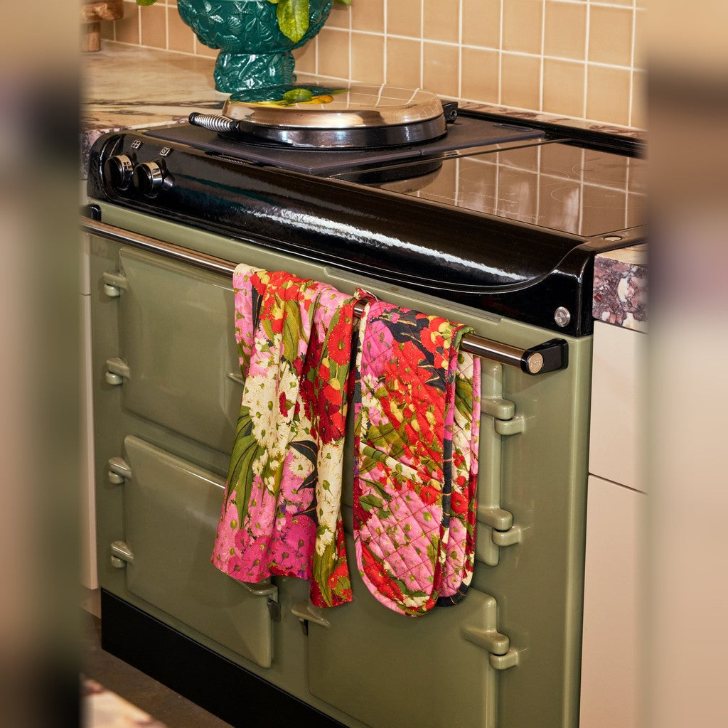 Kip & Co Australian Bush Blossom Double Oven Mitt hanging on an oven