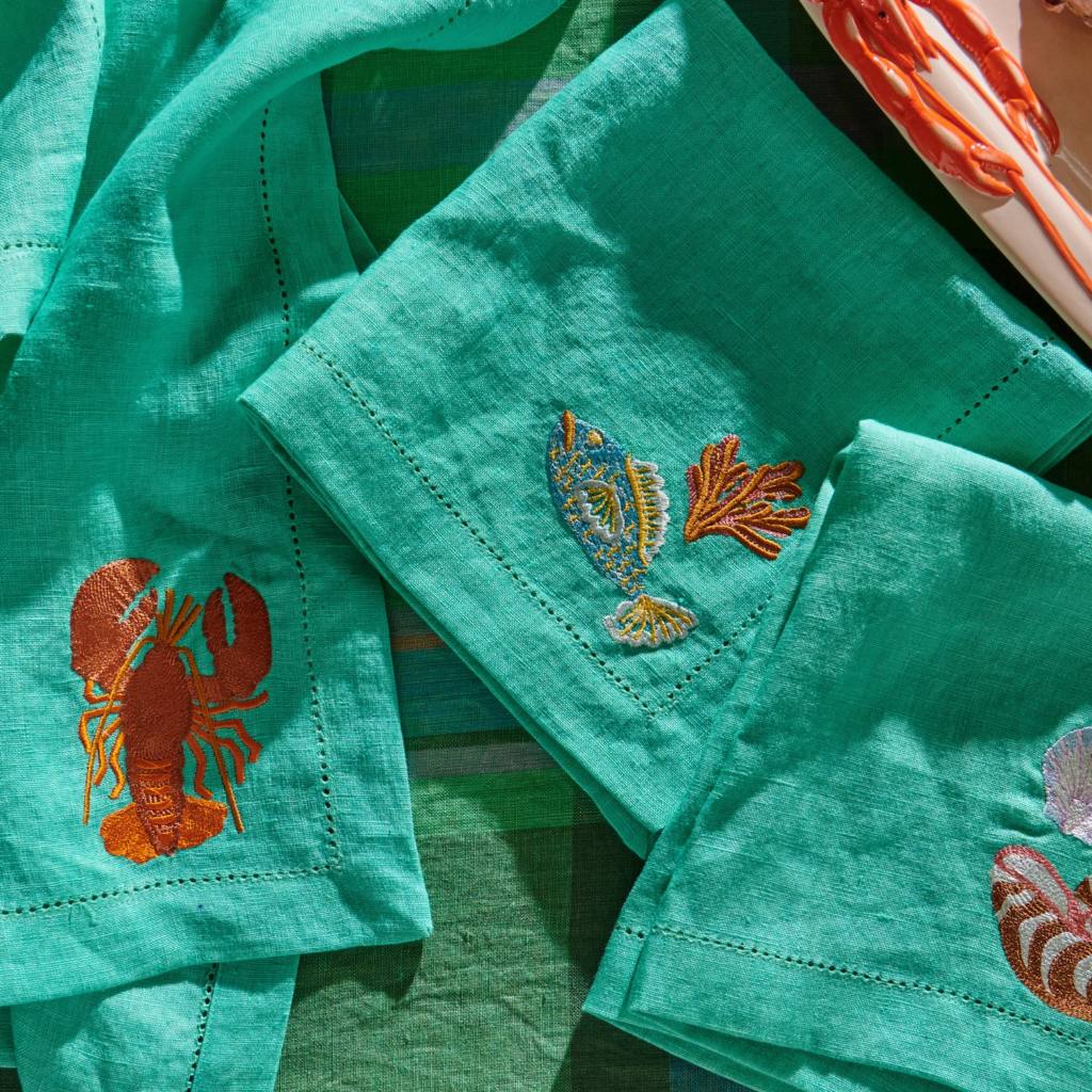 Kip & Co | Capri Embroidered Linen 4P Napkin Set - Cove. Beach Essentials