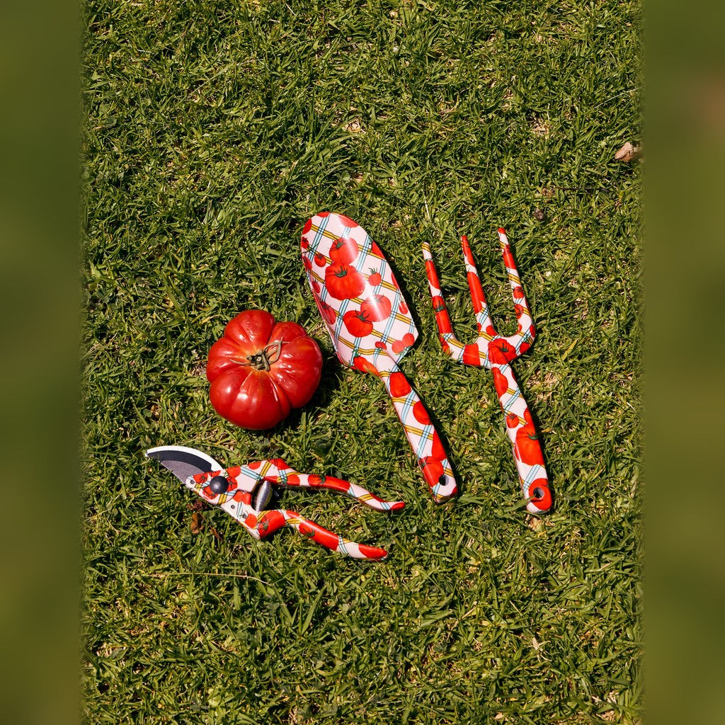 Kip & Co Pomodori Garden Tools and Gloves Set on grass with tomatoes