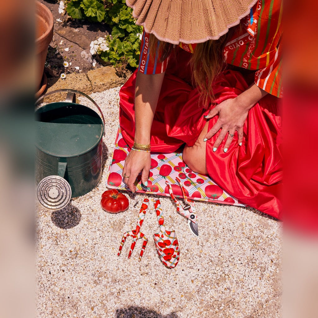 Woman gardening with the Kip & Co Pomodori Garden Tools and Gloves Set