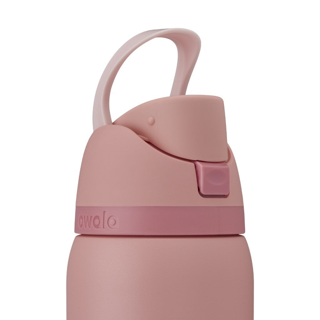 Owala FreeSip Water Bottle 945ml Rose Quartz with the carry loop up