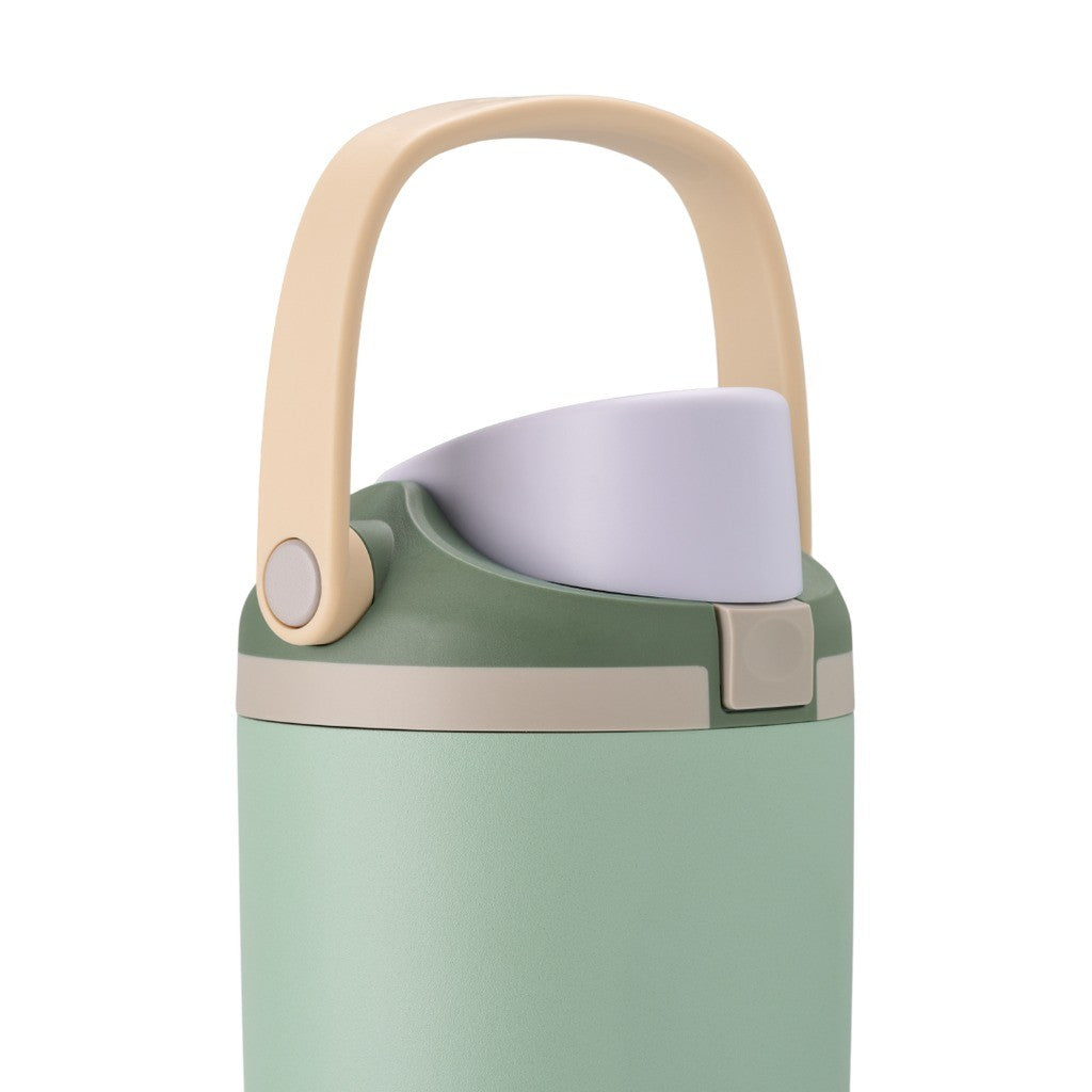 Owala FreeSip Sway Water Bottle 1185ml Eucalyptus with the carry handle up