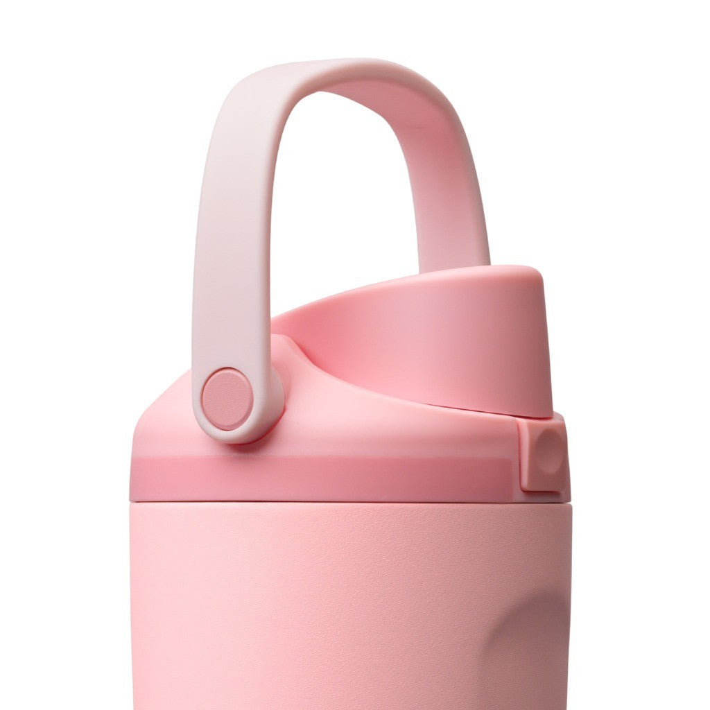 Owala FreeSip Sway Water Bottle 530ml Rose Quartz with the carry handle up